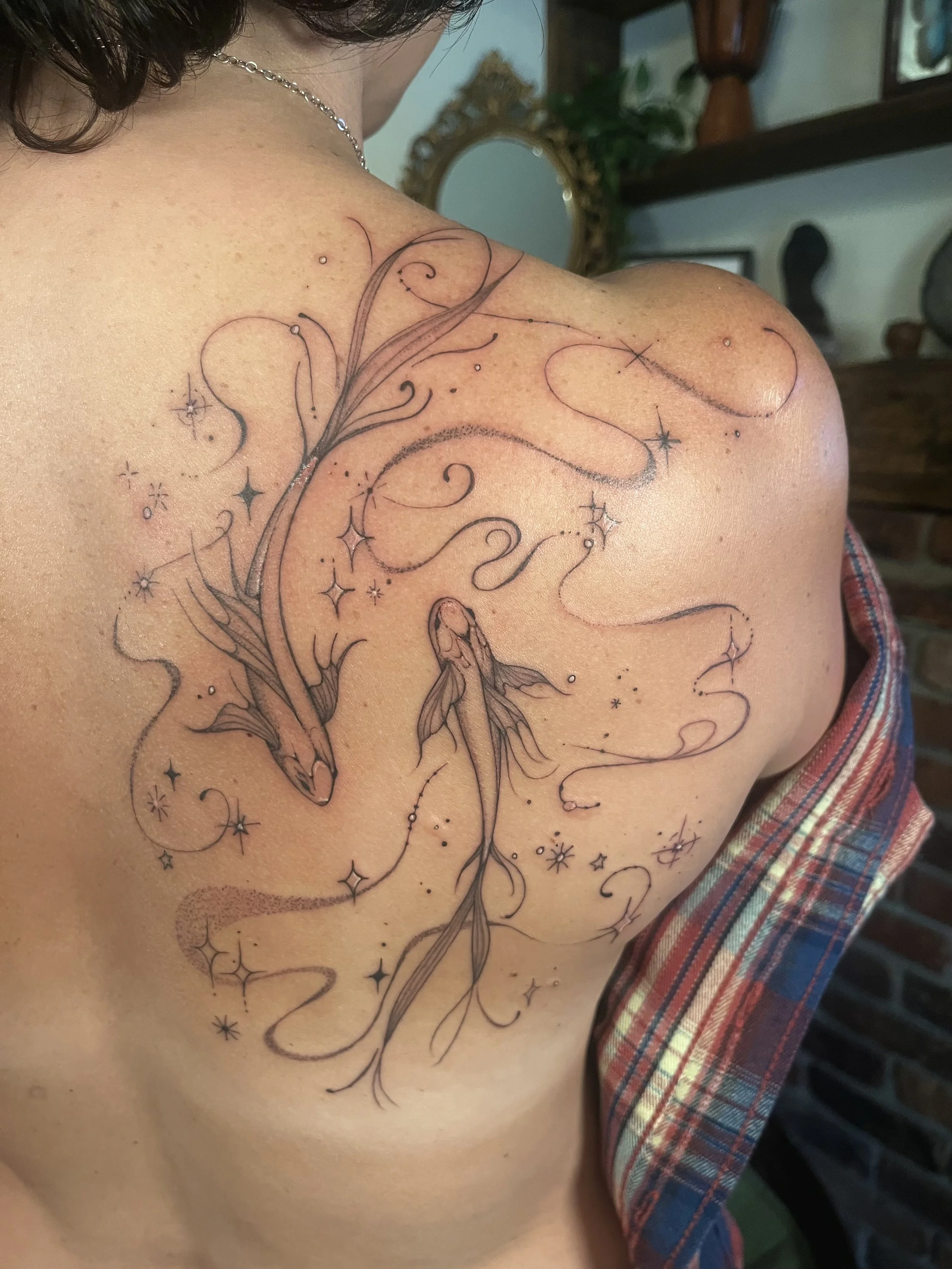 Pisces fish tattoo