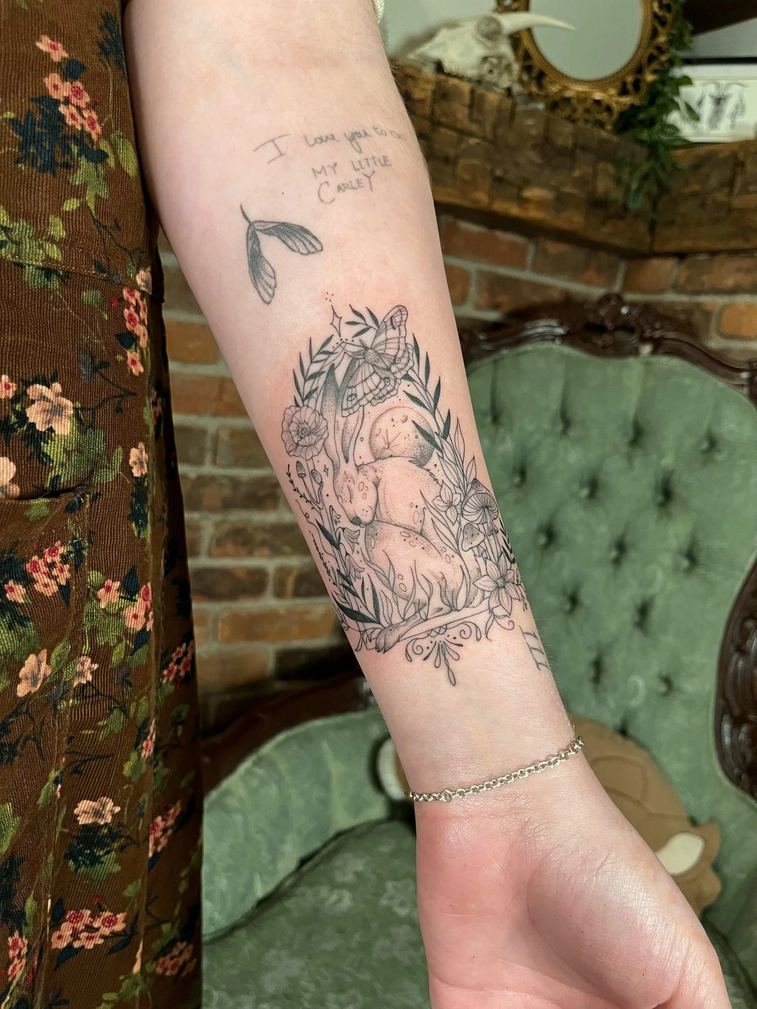 Vintage rabbit and flora tattoo